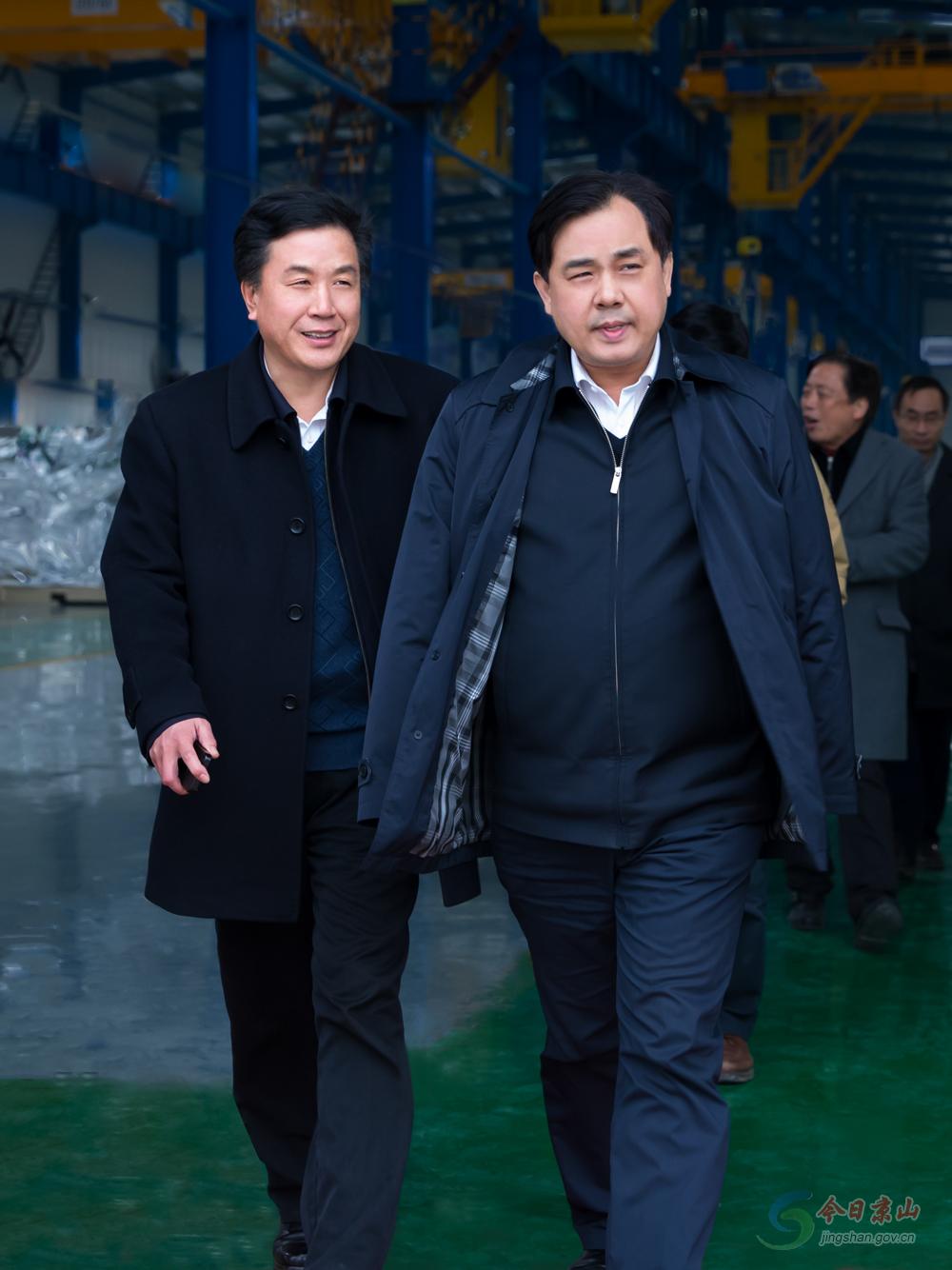 胡小国陪别必雄参观京山轻机